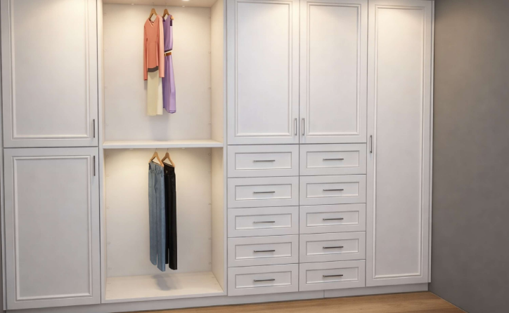 Custom closet wall with hanging storage and drawers