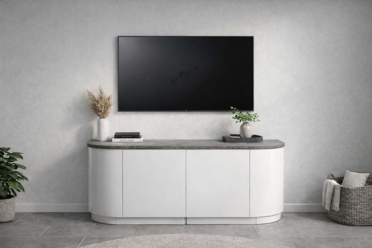 Curved white media console with a stone-look top and coordinated TV placement